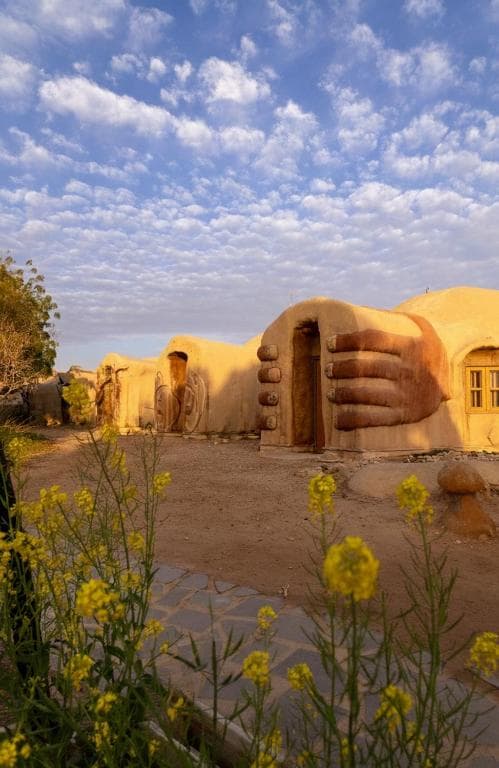 Eco-lodge building exterior at Kibbutz Lotan in the Galilee