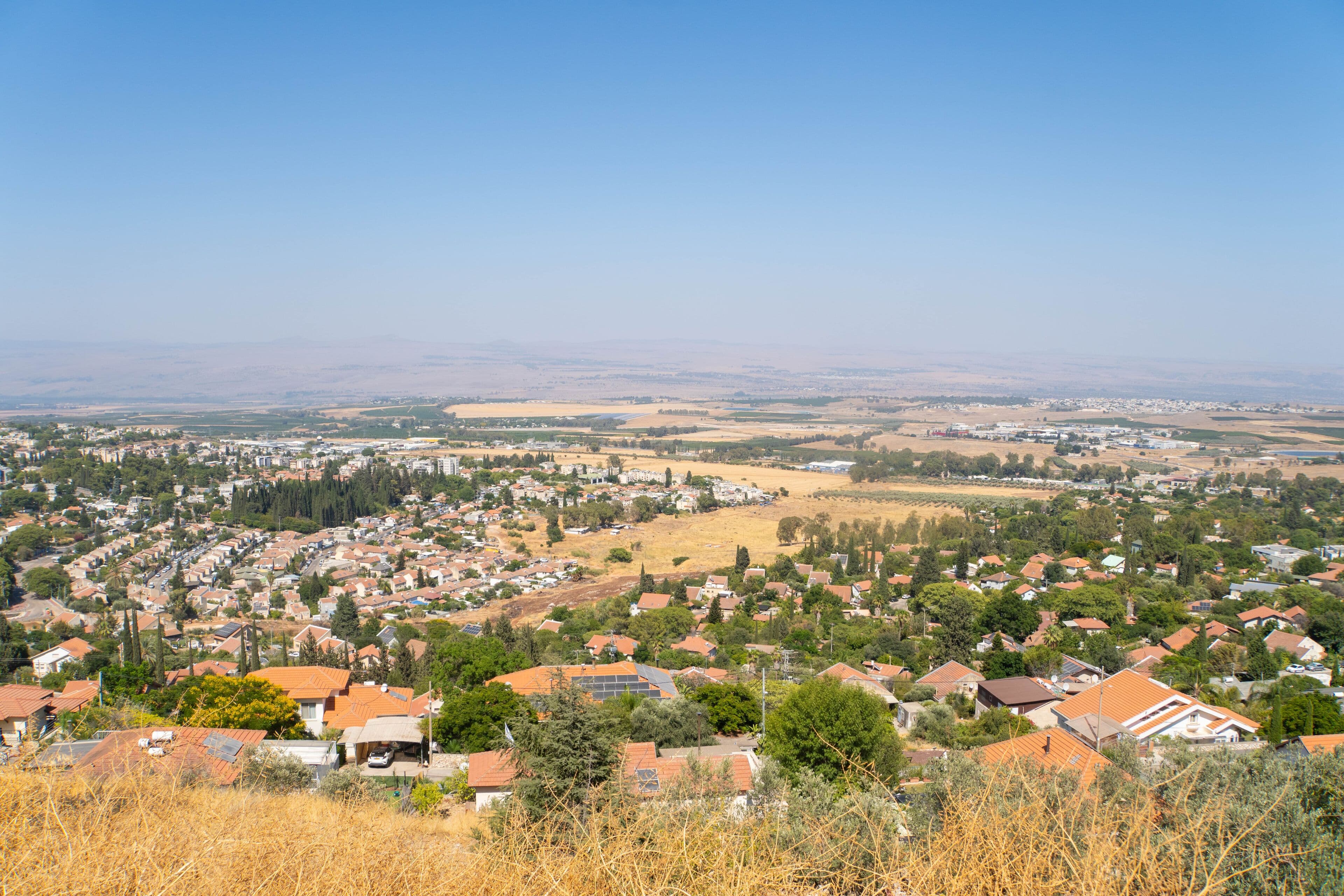 Residential street scene with apartment buildings in a Northern Israel town near Ramat Yishay