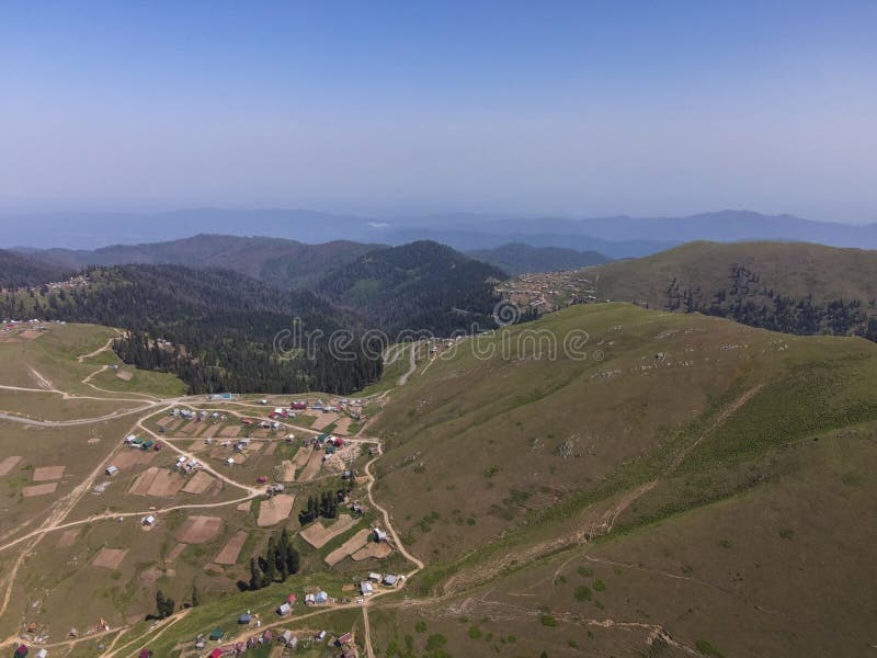 Landscape view of Bakhmaro ridges and hamlets in Guria, Georgia