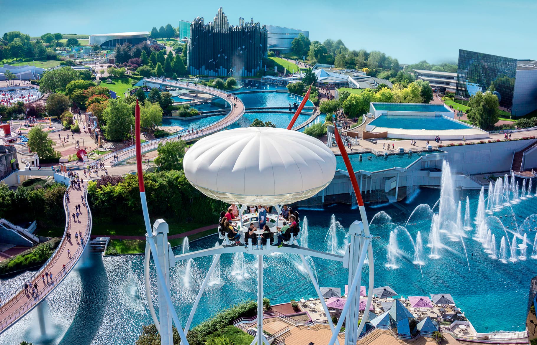 Global top theme parks with diverse attractions and landscapes