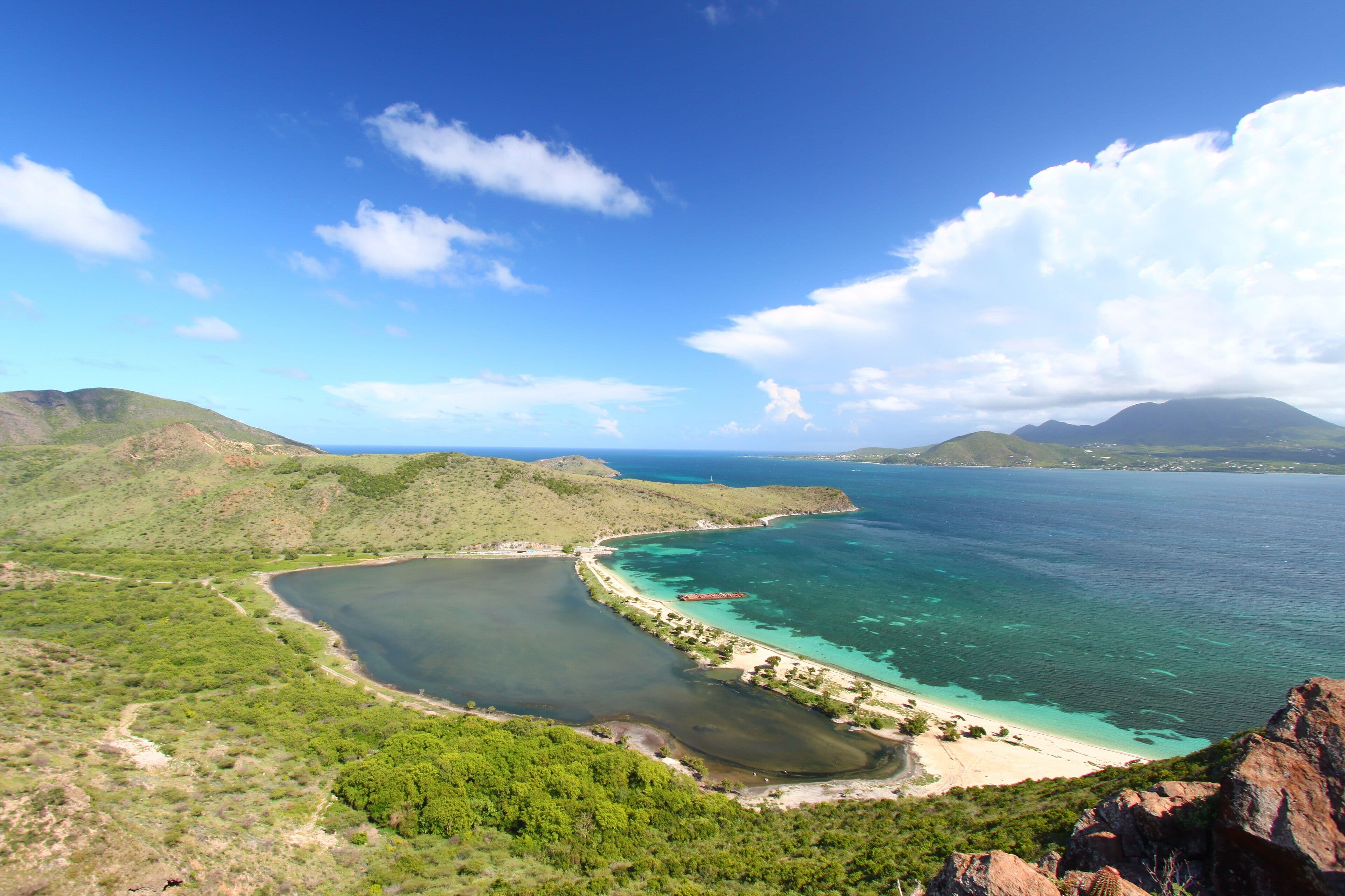 Bright sunny beach and ocean view in Saint Kitts representing spring weather