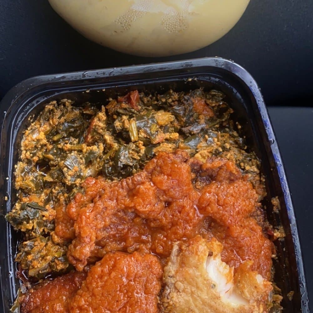 Close-up of traditional Malian dishes including tô, riz au gras, and bissap served on a table
