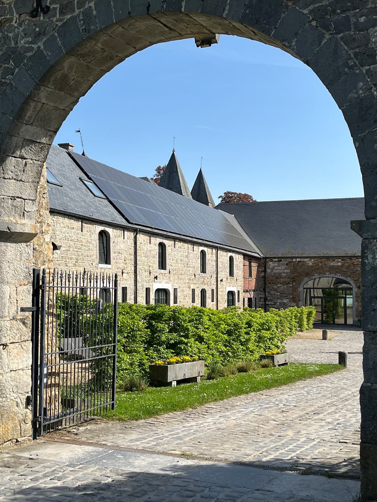 Stone house exterior with terrace in the Belgian Ardennes near Amay