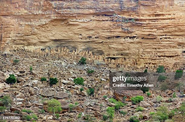 Traditional Dogon villages built into the Bandiagara cliffs in Mali, showcasing unique cliffside architecture