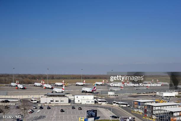 Exterior view of Vienna International Airport terminal, spring season, showing modern architectural details