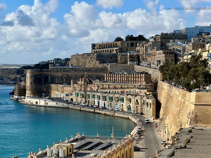 View of the Valletta waterfront promenade and Grand Harbour waters in Malta