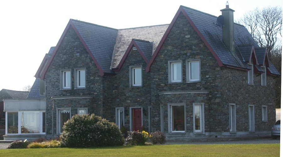 Historic stone cottages and architecture exterior in Dunmanway, Ireland