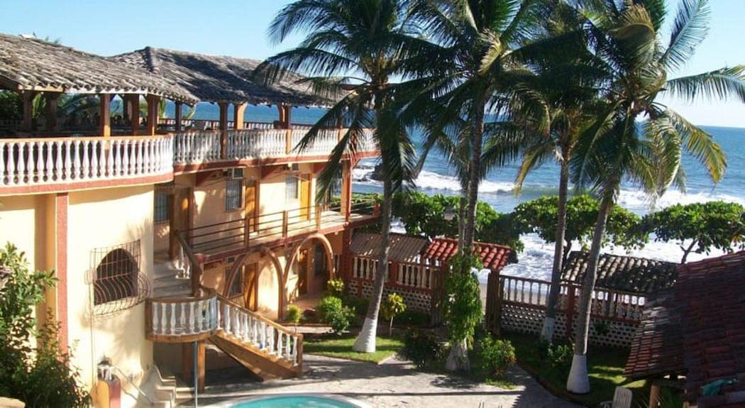Exterior of a beachfront hotel in La Unión, El Salvador, overlooking the ocean