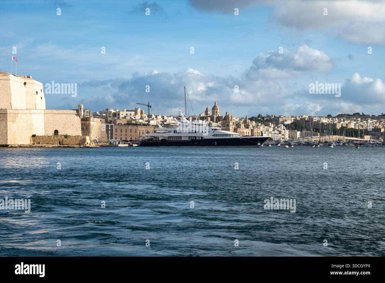 Scenic vista overlooking the Grand Harbour and Three Cities from the Upper Barrakka Gardens in Valletta, Malta