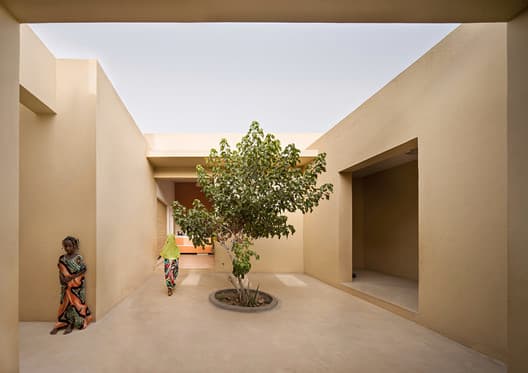 Interior view of a traditional style courtyard with arches in Djibouti architecture
