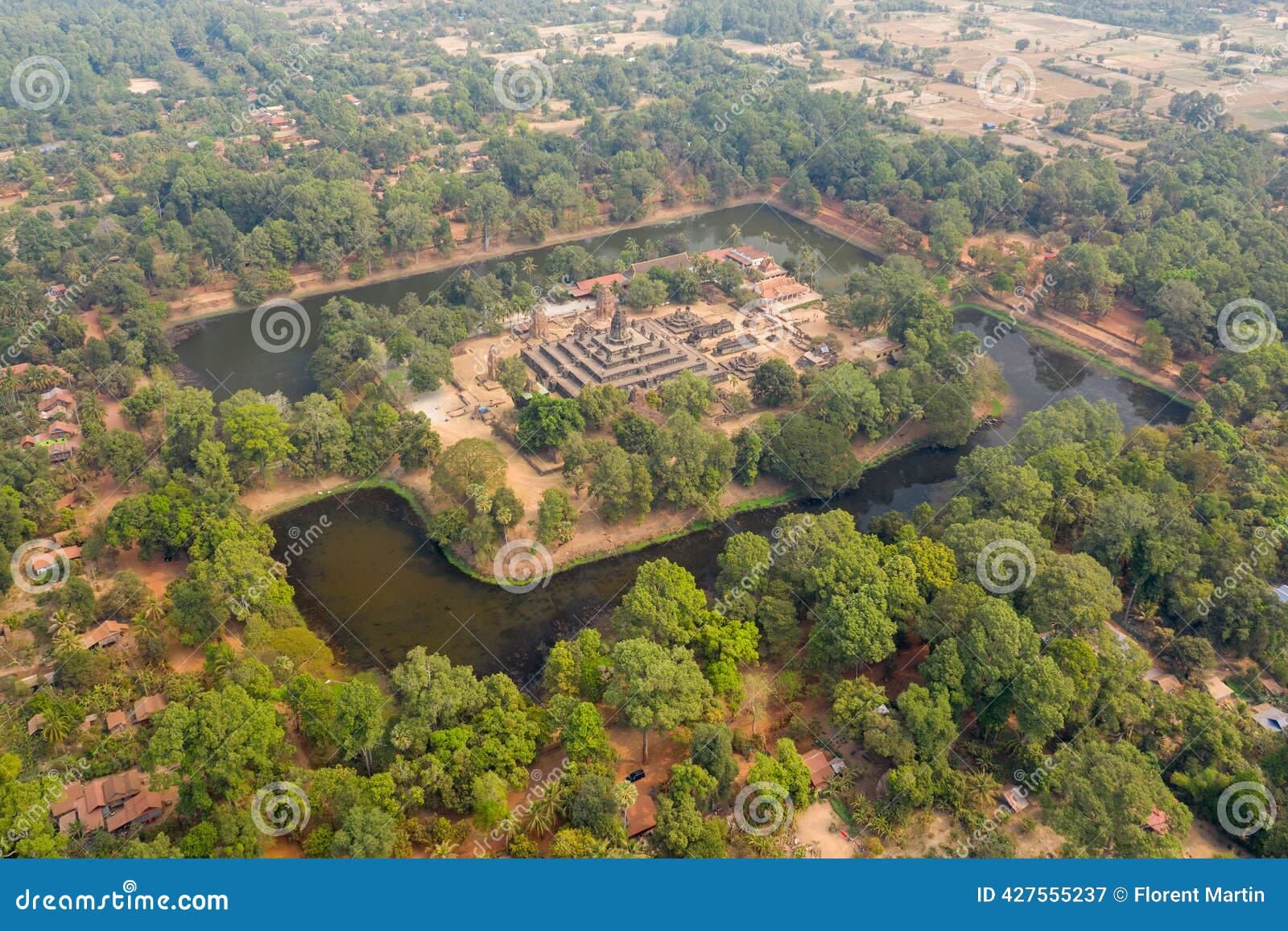 High-angle aerial perspective of Prasat Bakong temple and its encircling moat in Cambodia