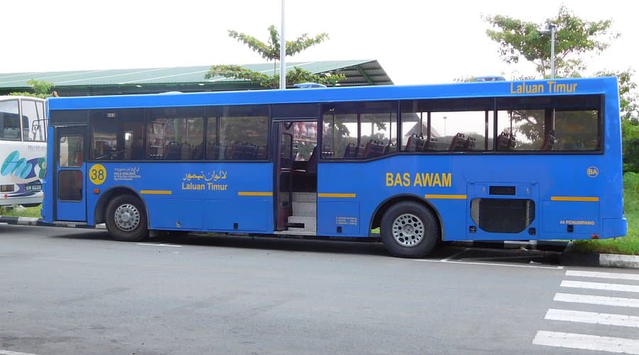 Serasa Ferry Terminal street view showing a minibus service for public transportation in Serasa, Brunei.