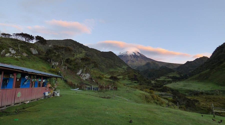 Trekking trail in the Andes mountains near Rivera, Colombia, showing green valleys and mountain peaks during spring