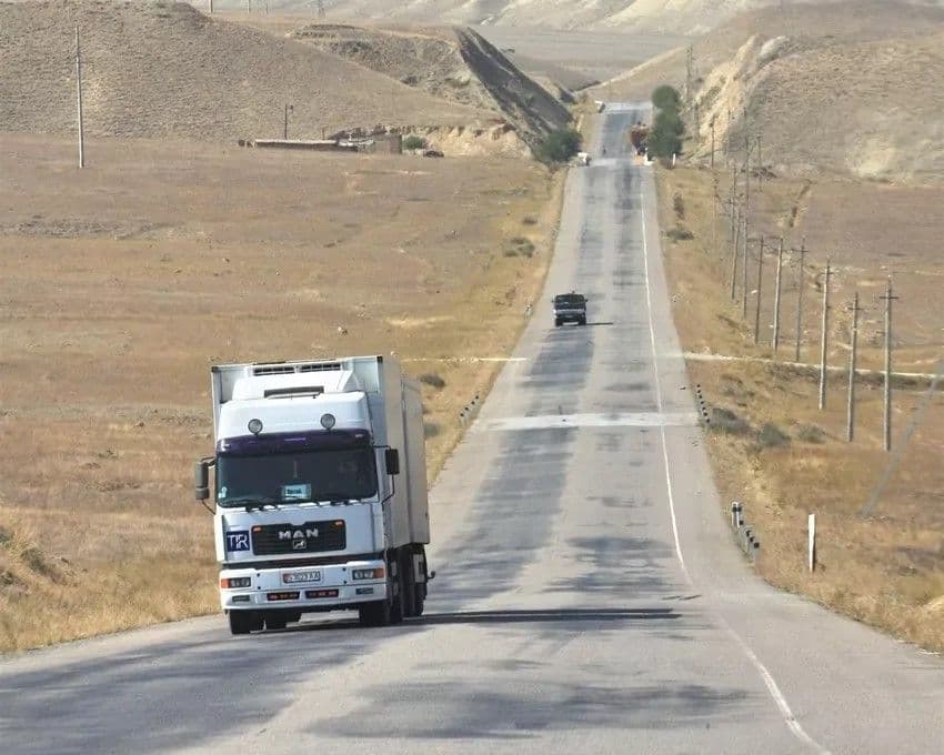 Road through arid hills in the Khatlon region near Kolkhozobod, Tajikistan.