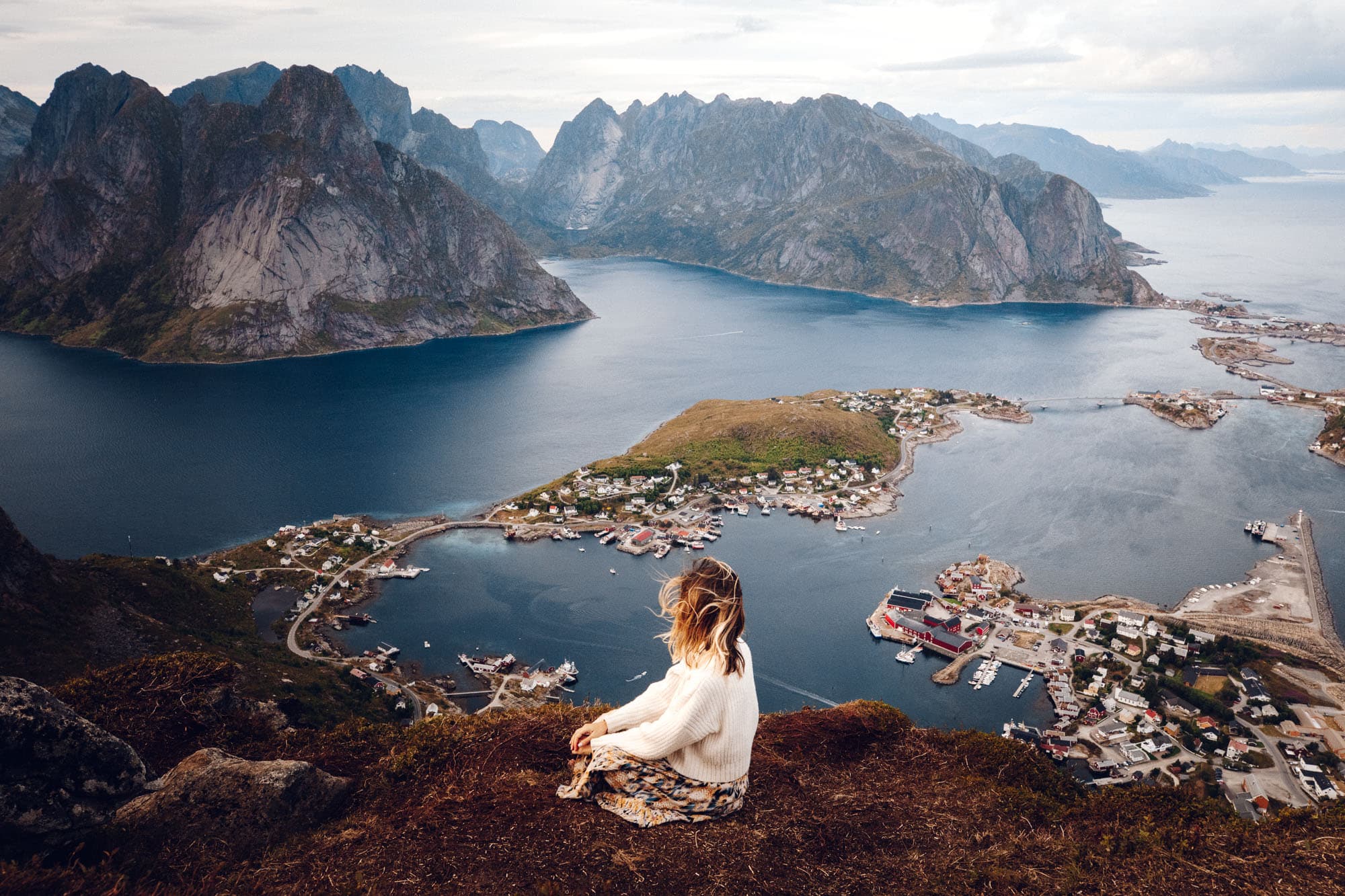 Travel guide to visit in summer Lofoten Islands Norway scenic landscape with mountains and sea