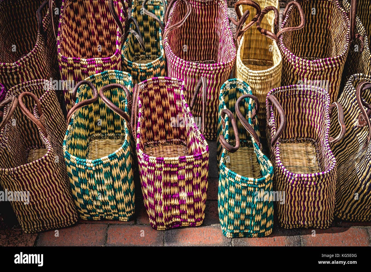 Local market in Allada, Benin, featuring handmade crafts and wicker baskets for sale