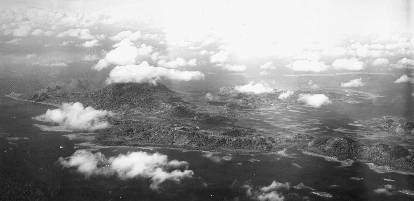 Aerial photograph of an island coastline with lagoon and shoreline